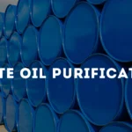 Feature image for waste oil purification blog showcasing blue oil barrels and eco-friendly resource recovery